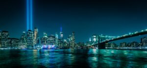 Manhattan skyline at night seen from Brooklyn. Tribute in Light, September 11, 2019